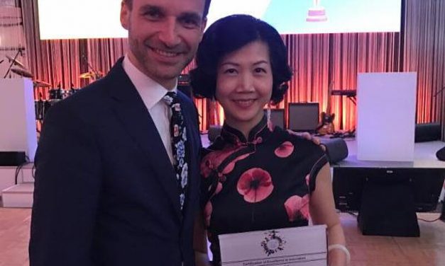 IAPCO President Mathias Posch with Award winner Amber Chen
