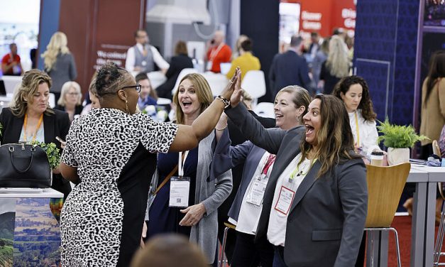 Meeting and greeting on the show floor. Photo; IMEX America